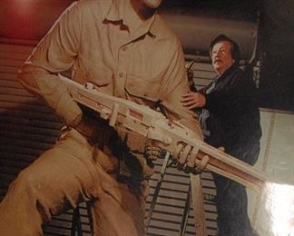 Photo of Greenville artist Gordon Thomas sculpting the clay version of his larger than life portrayal of WWII hero Audie Murphy. It was later cast in bronze and it graces the entry to the Audie Murphy/American Cotton Museum in Greenville.