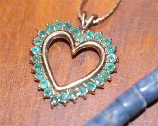Emerald and gold pendant with gold chain