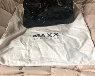 Maxx purse in very good condition, No scratches, no odor, hardware works great. Barely used