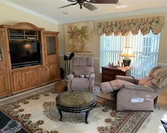 Matching Pride lift/recliner massage chairs. White washed pine entertainment center. Asian style coffee table. 8'x11' Open Field w/ Central Medallion Persian rug,