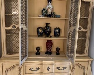 French Provincial hutch with chicken-wire doors.