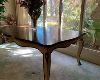 Beautiful French/Italian table, also bought in Europe for castle. Solid wood measures 144” long with 3 leaves in it. Top is burl with an inlay, the 3 leaves also have inlays on them.
