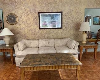 Matching coffee table with 2 matching end tables. Custom sofa.