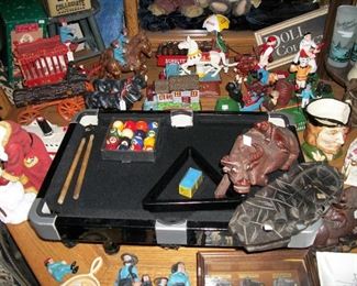 Cast iron banks and cars trucks wagons.....Mini pool table and much more