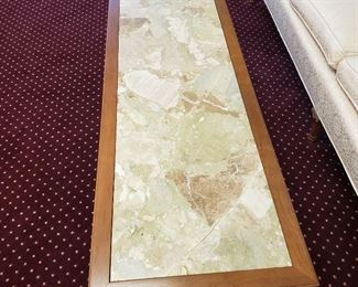Marble coffee table 62" x 21".  Crack in marble.