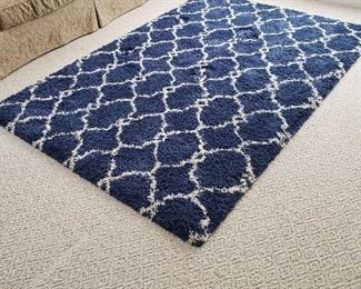 Navy and white graphic rug.  63" x 92"
