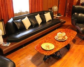 Adrian Pearsall floating sofa. George Mulhauser Plycraft chairs. Vintage coffee table. Danish lamps!