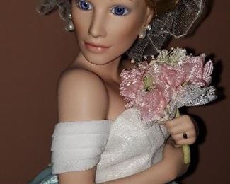 Close-up of Franklin Mint porcelain bridal doll
