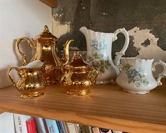 The gold teapot set is sold.