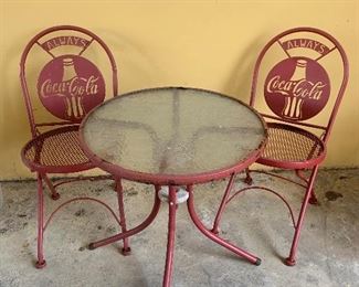 The two (2) chairs are sold. The table is still available.