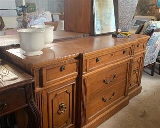 Two white pots on console are sold.