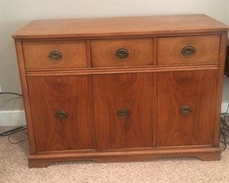 HUTCH.  Hutch from 1940s.  Lovely piece, may need some sanding and finishing work.  Drawers and cupboards are sturdy and intact.  Includes 3 drawers and 3 cupboards.  Three lower cupboards do not have shelves.  All hardware is working and intact.  (W 50”, H 30”, D 20”) $65.  This item is in the basement.