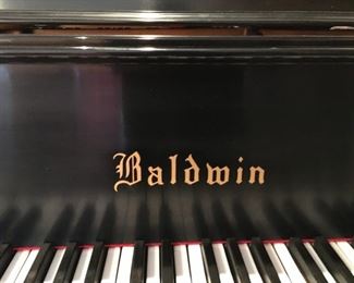 BABY GRAND PIANO.  Beautiful eight foot Baldwin baby grand piano and bench.   (W  65”, H 37”, D 56”) About 65 years old, seasoned and played often.  Has a softer, gentler action which makes it easy to play and gives it a beautifully rich sound.  Was tuned about six months ago. Recently appraised at $5,000.  Sell for $3,300. Comes with tuning fork.  CASH ONLY