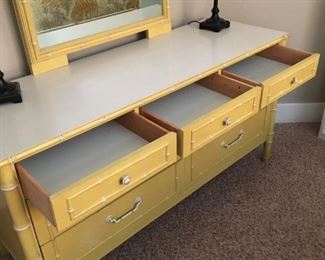 YELLOW BEDROOM SET.  Lovely yellow bamboo pattern bedroom set.  High quality.  Two twin headboards, but no frames, mattresses or box springs.  One matching bedside table with one drawer (W 24”, H 24”, D 16”).  One wide dresser with 7 drawers and attached mirror (W 56”, H 29”, D 19” mirror W 29”, H 42”), one tall boy dresser with 
5 drawers (W 36”, H 45”, D 19”)  New, $800, sell for $250.   CASH ONLY                                                                          
This item is in the basement.