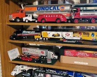 Case of varying scales of Trucks, trailers, and tankers as well as original 50th anniversary Corvette 5-pc set with COA.
