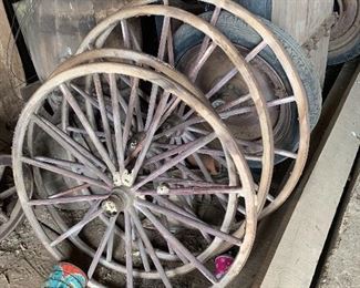 Old wagon wheels in various sizes