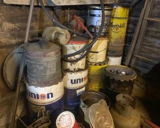 Vintage gas and oil barrels, cans