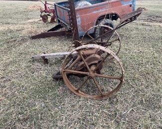 Antique farm implement, old truck bed trailer