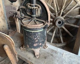 Antique fruit/meat press on primitive wood bench, Old wagon wheels