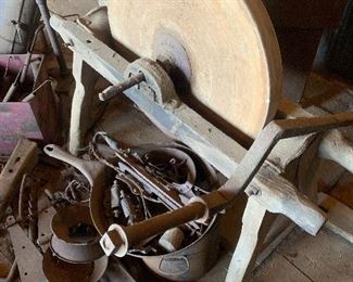 Antique grinding stone with stand and pedal