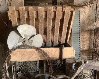 Old primitive wood feeder, barbed wire, old metal, wire crates 