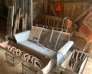 Mid century basket weave glider - needs straps, large galvanized tote, pick ax heads, old horse shoes, old repurposed metal feeder, wire crates, feed sacks, old doors, double tree horse accessories, Large wood feeder grill, Gillette store displays, farm tractor slow moving reflector signs