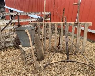 Old horse drawn farm implements, old hand tools, wood crate, galvanized pieces, old farm gates