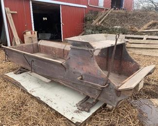 Early buckboard wagon 