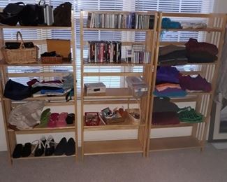 Folding wood shelf units, womens clothes, cds and dvds