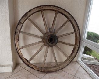 Very Old Wagon Wheel belonged to their Grandfather