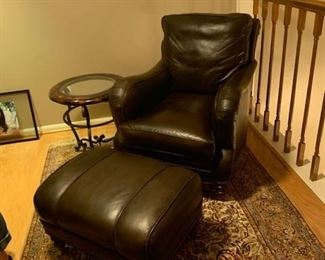 Leather chair with ottoman. 