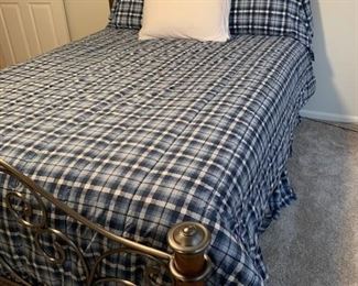 Metal queen bed frame with mattress and box spring. 