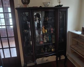 Curio cabinet filled with smalls