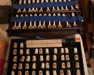 Collections of bird spoons and thimbles