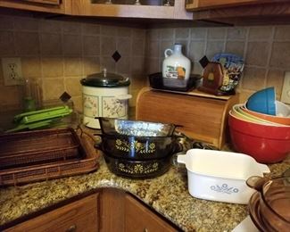 Bread box, corning ware, mixing bowls, crock pot