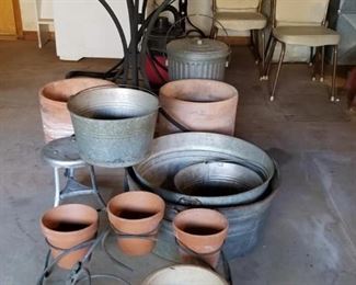 Galvanized tubs, garden pots, wrought iron bar tables