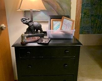 Antique chest painted black, elephant lamp