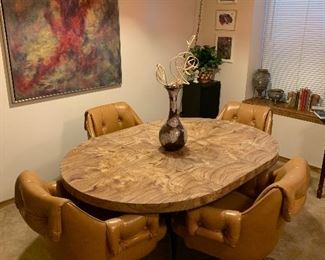 Round table with leaf and four chairs