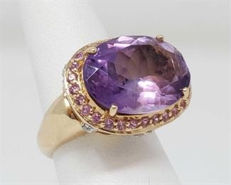 50: 14k Amethyst Oval Mixed Cut Ring w Diamonds and Pink Sapphires, 6.5 Appraised Over $3000 Size Approximately 6.5 weighs approx 8.4g Includes AIG Gem Laboratory Certificate. 1 Amethyst- Oval Mixed Cut 28 Pink Sapphire- Round Mix Cut 20 Diamonds- Round Brilliant Cut. Appraised Price $3,039.00 US
