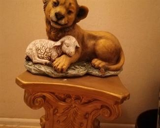 Lion and sheep statue