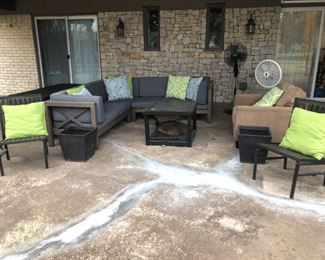 Outdoor Sectional sofa ,Fire pit, fans, folding metal chairs, flower pots, large storage truck and decorative pillows 