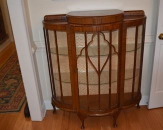 Bow front art deco china cabinet with silver storage on top. Circa 1930's