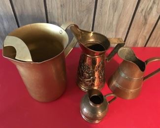Copper & brass pitchers , and other 