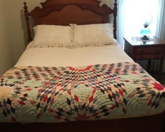 Gorgeous bed and handmade quilt 