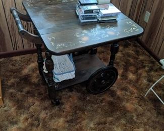 Tea cart with stenciling on top