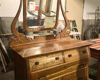 Oak dresser with original beveled mirror.$120