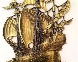 Brass base relief of a Spanish galleon