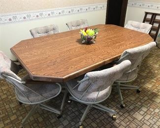 Kitchen Table with 6 chairs and one leaf.  Matching barstools are not pictured.
