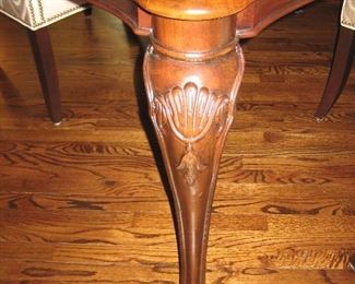Dining Table with Carved Legs and Two Leaves


