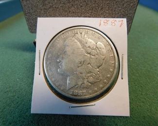 Lot 64. 1887 Morgan Dollar